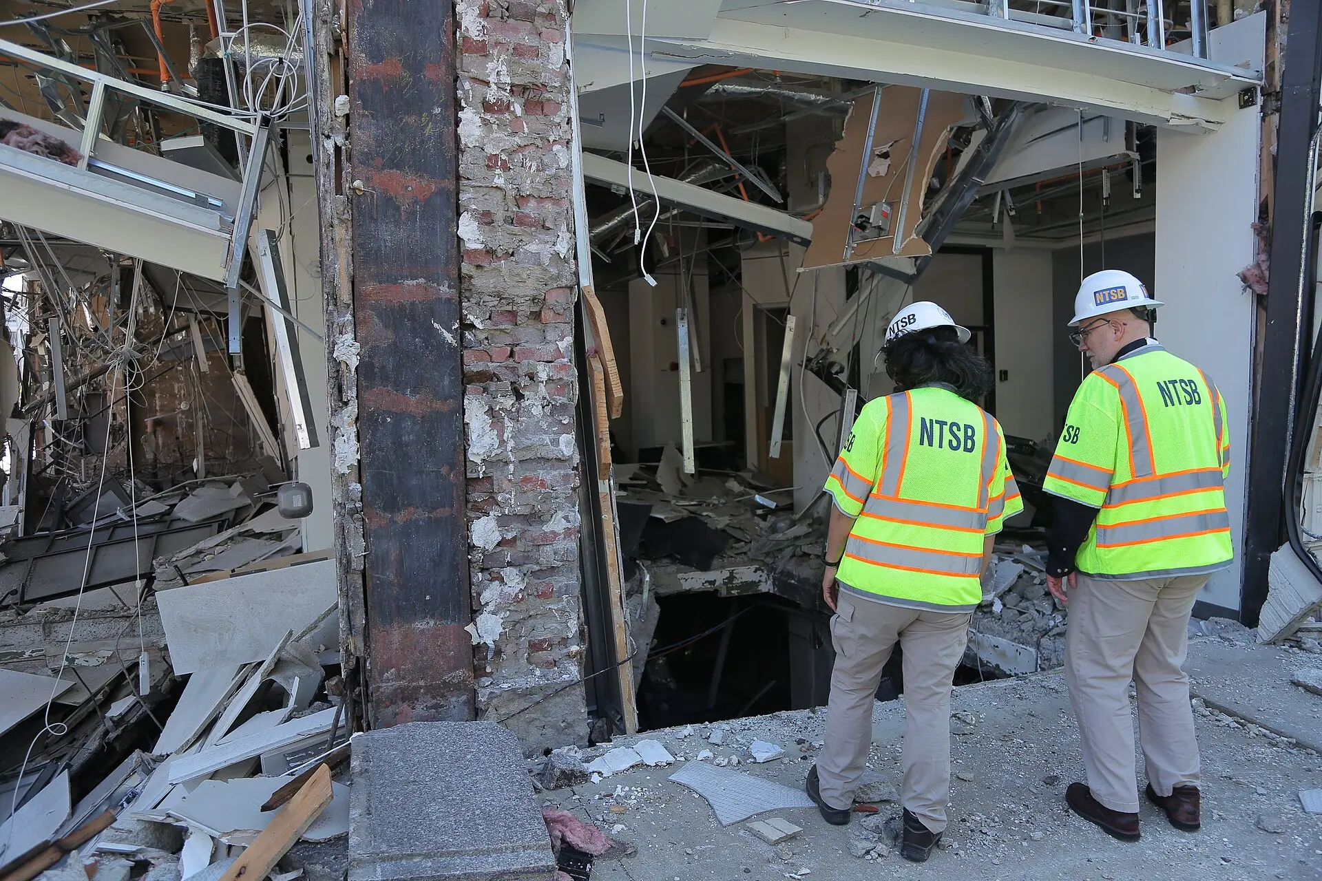 National Transportation Safety Board (NTSB) investigators walk the scene of the May 28 natural gas explosion in downtown Youngstown, Ohio on 30 May 2024 03